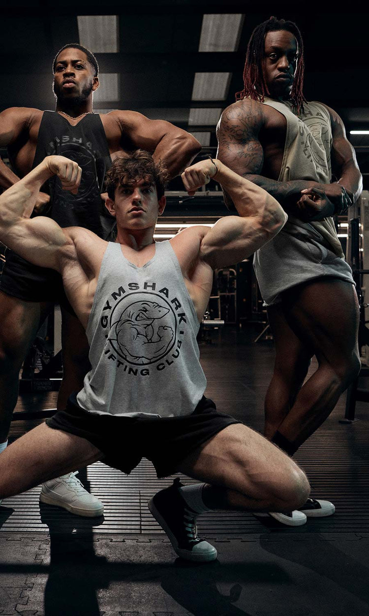 Male Gymshark athletes posing in the latest legacy colors 